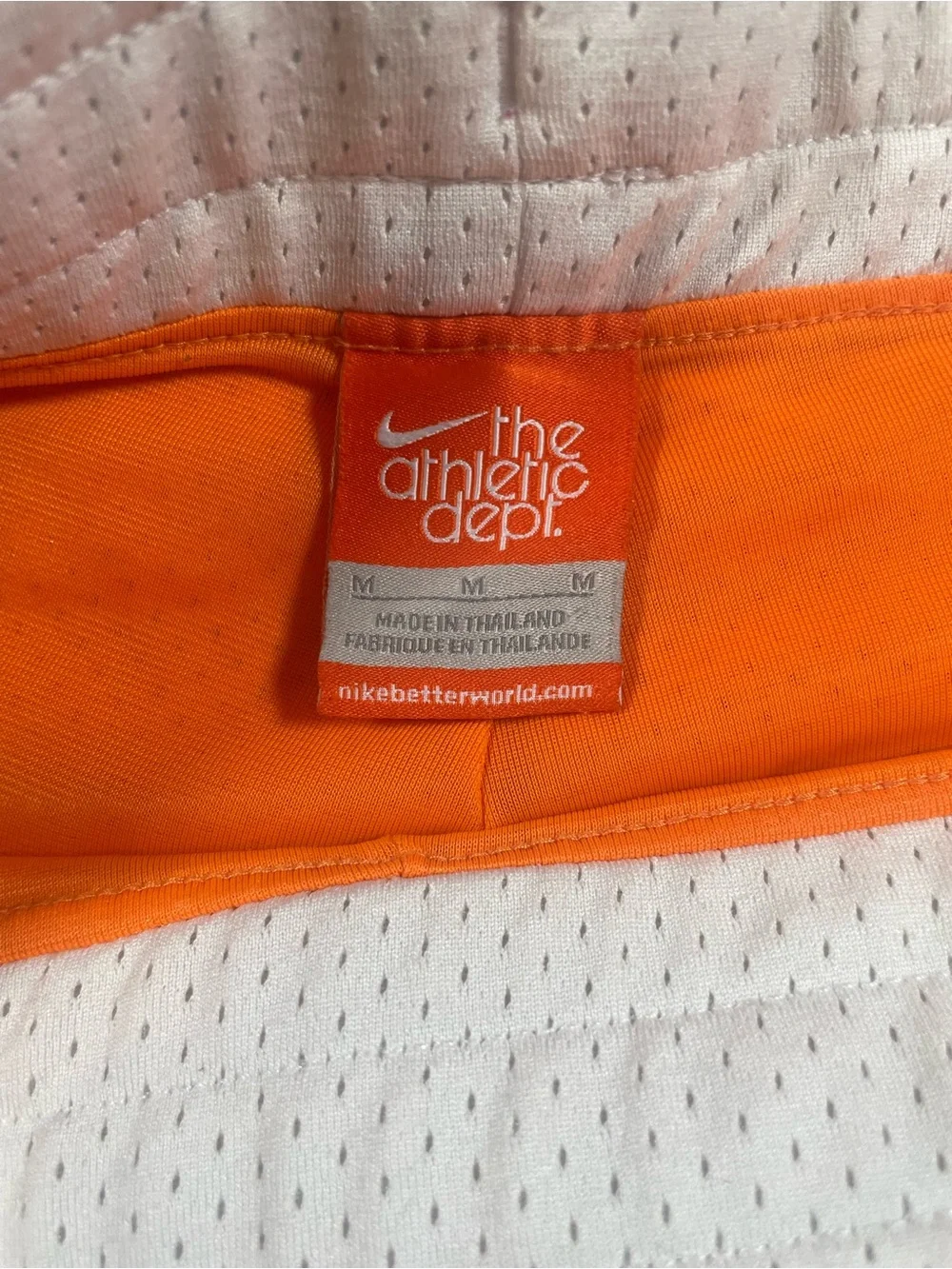 Nike Women's Orange Mesh Athletic Shorts with Pink Drawstring